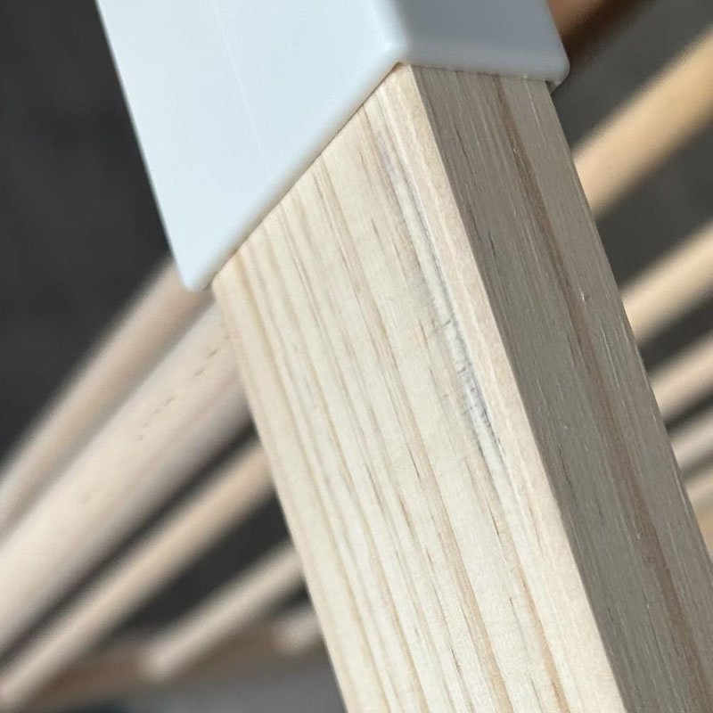Smooth sanded wood surface of the playpen frame